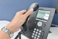 Human hand picking up the telephone Royalty Free Stock Photo