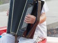 Human hand playing the accordion Royalty Free Stock Photo