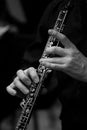 Human Hand playing the oboe closeup