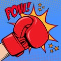 Human hand in pop art style with boxing glove. Pow. Design element for poster, flyer. Royalty Free Stock Photo