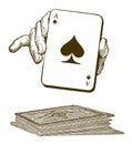 Human hand presenting an ace of spades playing card