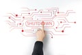 human hand presses the shutdown button on the virtual screen