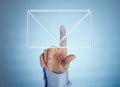 Human hand pressing virtual mail icon