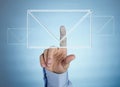 Human hand pressing virtual mail icon