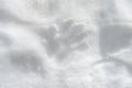 Human hand prints on the white snow
