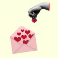 The human hand put a red heart into a letter Royalty Free Stock Photo
