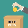 Human hand putting golden coin money with dollar sign into donation paper cardboard box. Helping hands concept. Donate and help Royalty Free Stock Photo