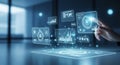 Hand interacting with a futuristic holographic interface displaying data charts and analytics floating above a tablet Royalty Free Stock Photo