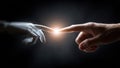 Human hand reaching out to touch a robotic hand, symbolizing the connection between technology and humanity, with a glowing light Royalty Free Stock Photo