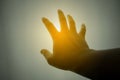 Human hand reaching for the sun Royalty Free Stock Photo