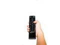 Human Hand with remote control on isolated white background (with clipping path) Royalty Free Stock Photo