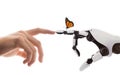 Human hand and robot arm reaching towards each other with butterfly on finger