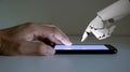 Human hand robot hand artificial intelligence technology touch screen smartphone