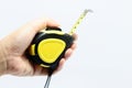 Human hand with tape measure Royalty Free Stock Photo