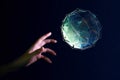 Human hand about to touch the earth globe, Earth Day concept Royalty Free Stock Photo