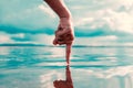 Human hand is touching water on the river Royalty Free Stock Photo