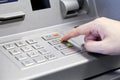 Human hand using ATM machine Royalty Free Stock Photo