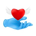 A human hand wearing blue protective surgical glove with a flying red heart with angel wings. Vector illustration of donating or Royalty Free Stock Photo
