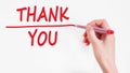 Human hand writing inscription THANK YOU on whiteboard Royalty Free Stock Photo