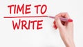 Human hand writing inscription TIME TO WRITE on whiteboard Royalty Free Stock Photo