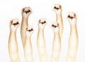Human Hands Clenched Fists Raised Up in The Air Royalty Free Stock Photo