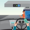 Human hands driving a car and showing car paying