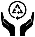 Human hands embracing a universal recycling symbol representing eco friendly conservation Royalty Free Stock Photo
