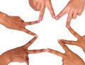 The the human hands forming a star with their fingers,touching by finger point against