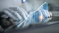 Human Hands and Futuristic Technology Interacting with Data Visualization, Graphs, and Analytics in a Modern Business Royalty Free Stock Photo