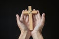 Human hands holding a cross holy and prayed for blessings from God,  Amour Worship God concept. - Image Royalty Free Stock Photo