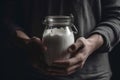 Human hands holding milk jar closeup. Generate ai