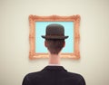 Human head in front of an empty painting