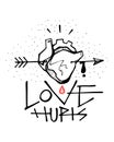 Human heart, arrow and Love hurts phrase