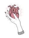 Human heart in graceful female hand isolated. Sticker, print or blackwork tattoo hand drawn vector illustration