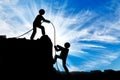 Human icon climber helping out another person climber Royalty Free Stock Photo