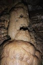 Human image of stalagmites and stalactites in the New Athos cave in Abkhazia. A popular place for tourists to visit.