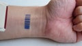 Human with implant micro chip scanning barcode imprinted on his hand