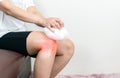 Human leg osteoarthritis inflammation of bone joints cold compress Royalty Free Stock Photo