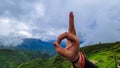 Human love of nature with awesome sign at green mountain with dramatic sky at morning