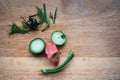 Human nthropomorphic Face Made Up Of Vegetable pruning on wooden board Royalty Free Stock Photo