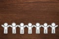 Group of people holding hands on wood. Teamwork concept. Social Network concept. Royalty Free Stock Photo