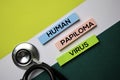 Human Papiloma Virus HPV text on sticky notes with office desk concept