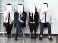 Human resource concept, Young businessman holding white billboard and waiting for job interview Royalty Free Stock Photo