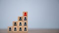 Human resource and talent management for recruitment business concept. Stack wooden block steps on a table with people icon, HRM, Royalty Free Stock Photo