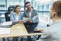 Human resource team talking to a candidate during a job interview in the office Royalty Free Stock Photo