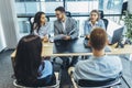 Human resource team talking to a candidate during a job interview in the office Royalty Free Stock Photo