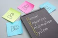 Human resources information system HRIS is shown on the photo using the text Royalty Free Stock Photo