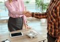 Human resources manager shaking hands with applicant during job interview Royalty Free Stock Photo