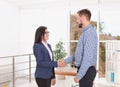 Human resources manager shaking hands with applicant during job interview Royalty Free Stock Photo