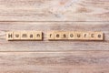 Human Resources word written on wood block. Human Resources text on table, concept Royalty Free Stock Photo